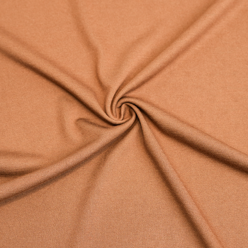 Sự khác biệt giữa vải Bamboo Polyester Jersey và vải polyester truyền thống là gì?